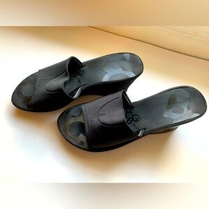 BCBGirls Black Slip-On Wedge. US 7M, 3in heel. Rubber wedge.